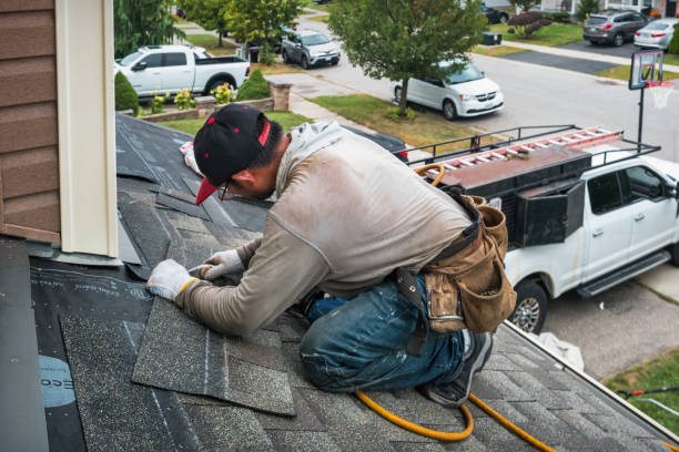 Professional Roofing technician working in Groveland, IL